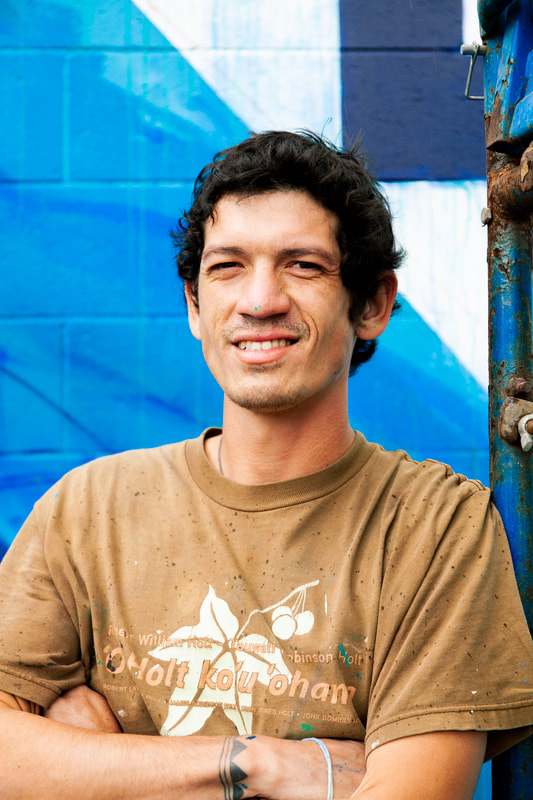 Portrait of artist Cory Taum